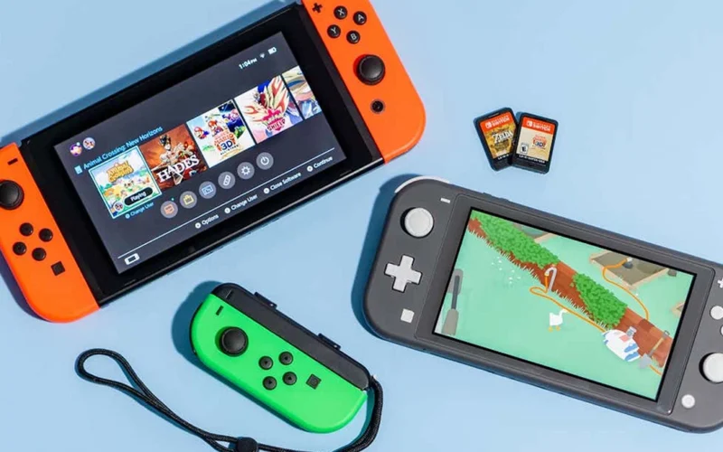 Two gaming consoles Nintendo Switch and Nintendo Switch Lite